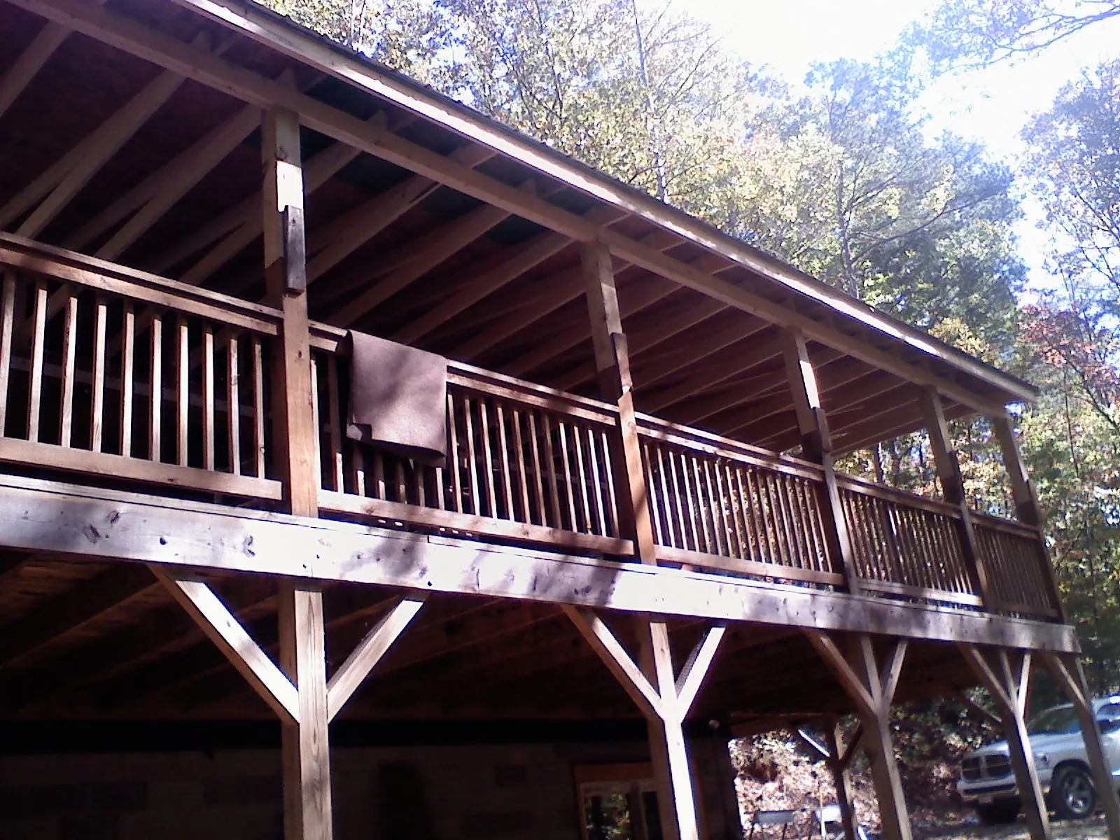 Timber framing under a new elevated porch and deck — Roof Leak Repair in Haven by Roofing Brothers
